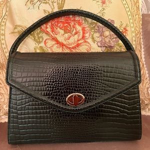 Croc and Boston green bag